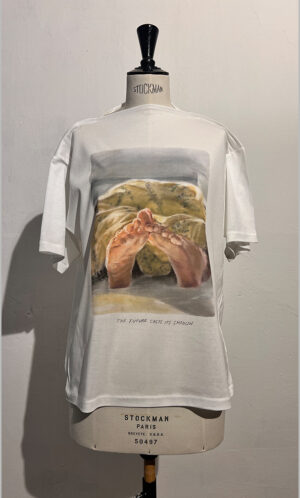 T SHIRT. THE FUTURE CASTS ITS SHADOWS